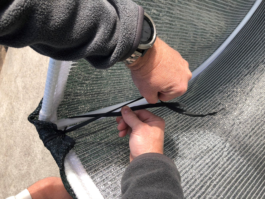 Tying a shade cover 